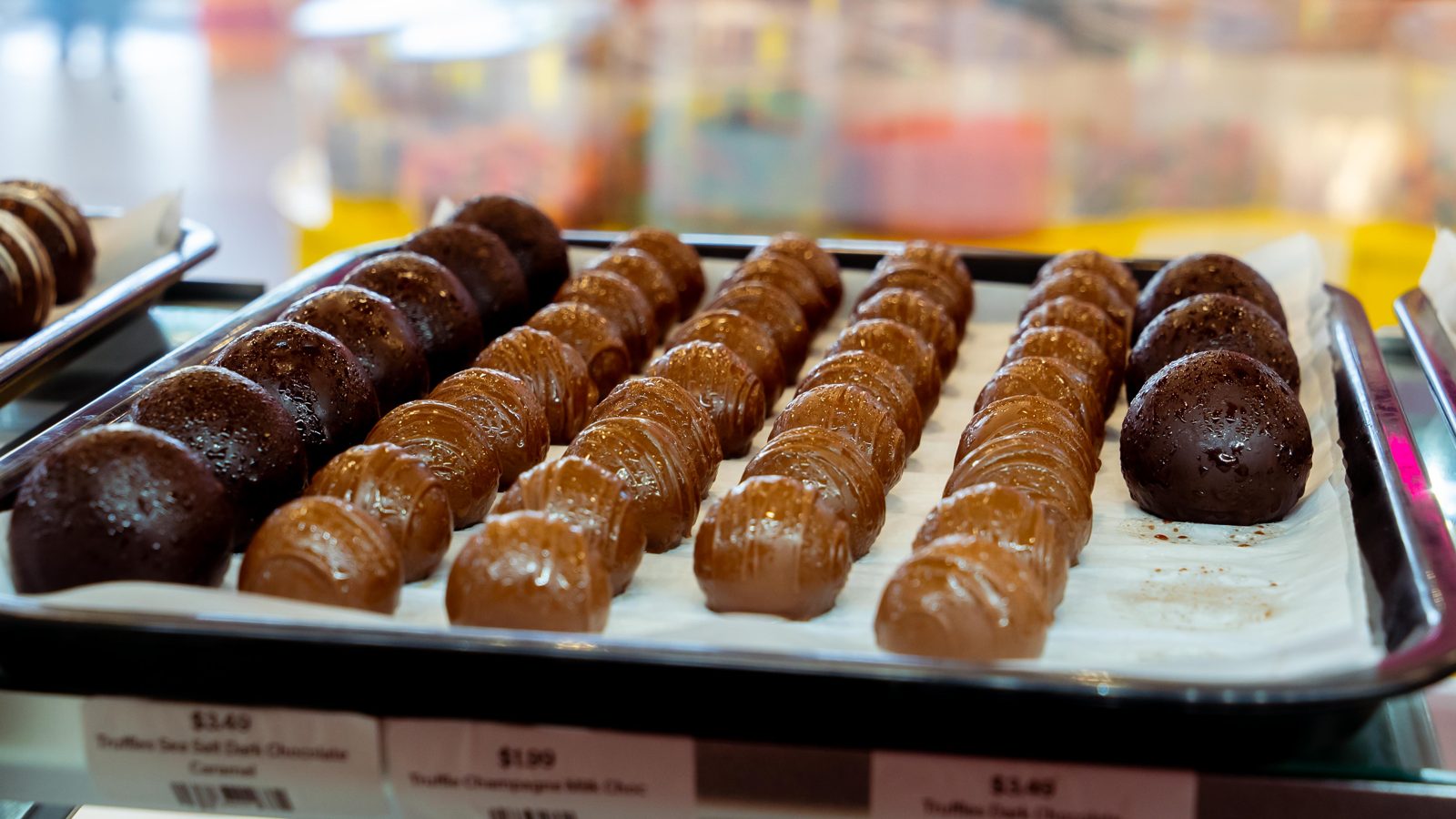 Tray of hand-dipped chocolate-covered treats in the candy case